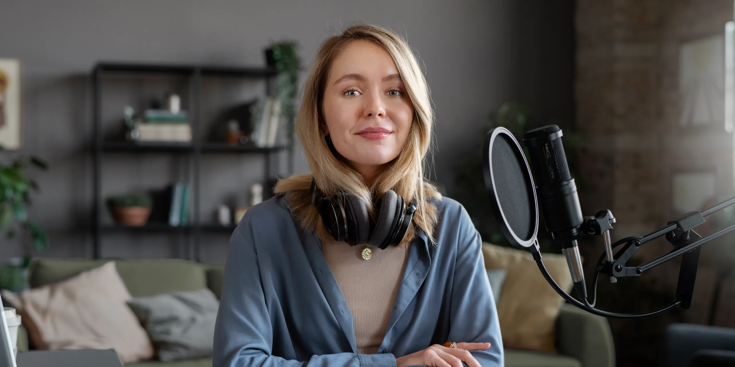 Podcaster smiling to camera