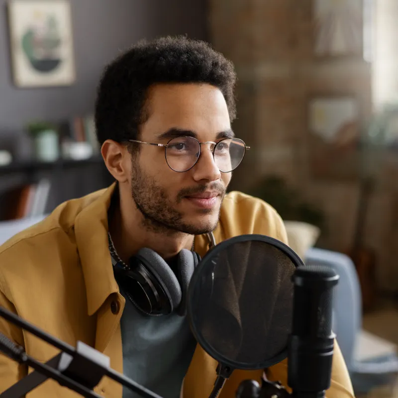 Podcaster smiling to camera