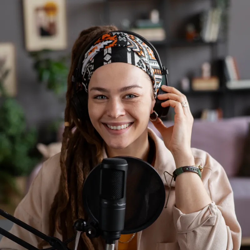 Podcaster smiling to camera